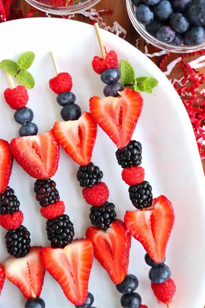 Overhead shot of 4th of July fruit kabobs on plate