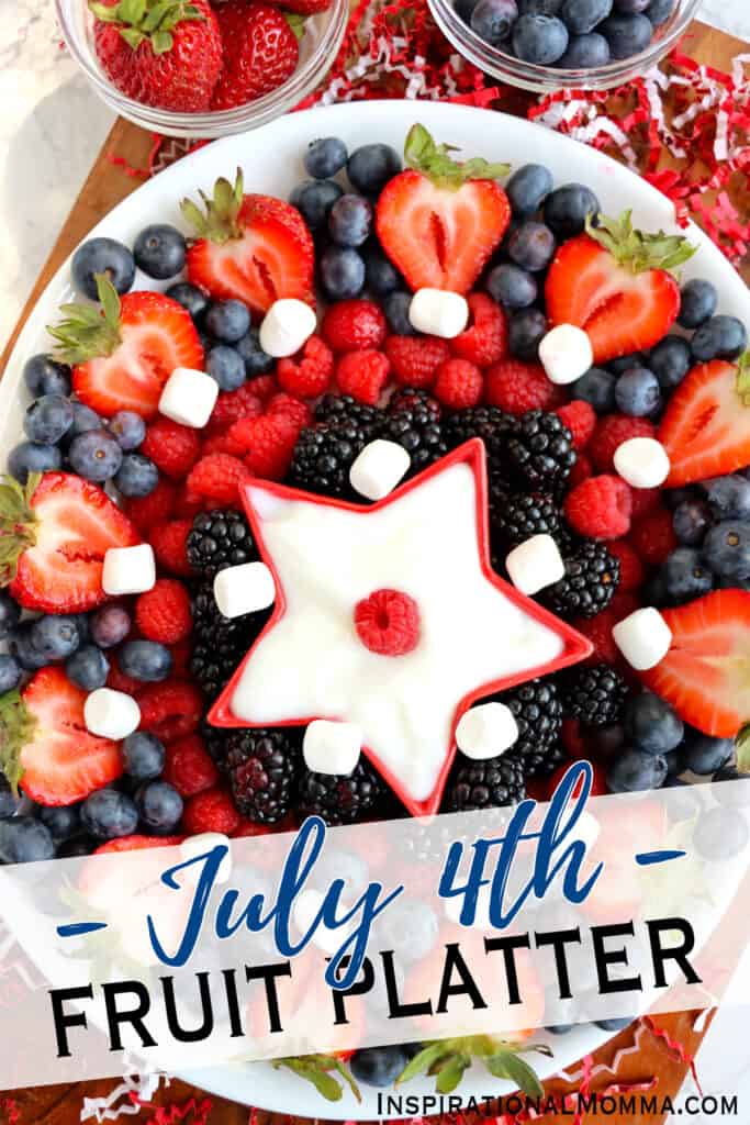 Overhead shot of 4th of July fruit tray with strawberries, raspberries, blueberries, and blackberries. 