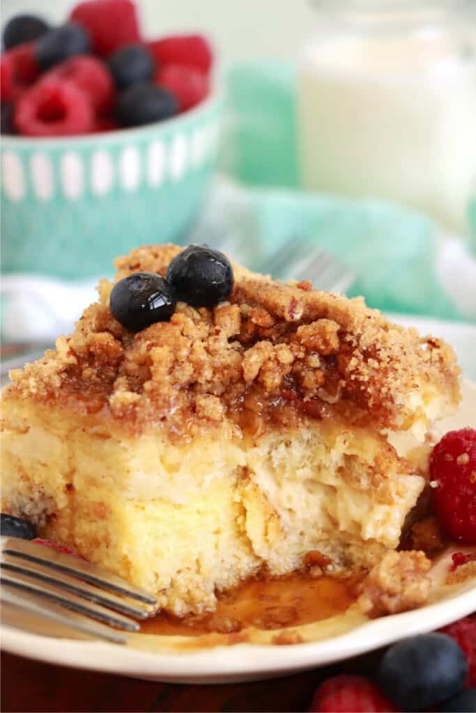 Closeup shot of slice of cream cheese stuffed French toast on plate