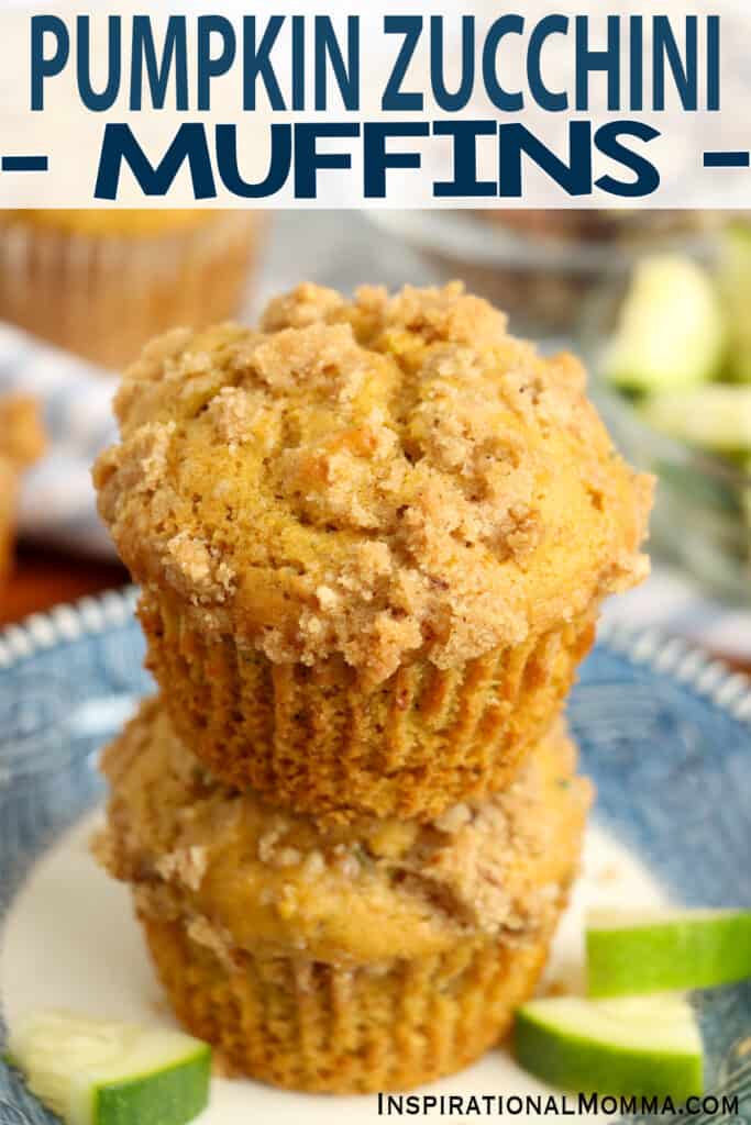 Closeup shot of two pumpkin zucchini muffins stacked atop one another.