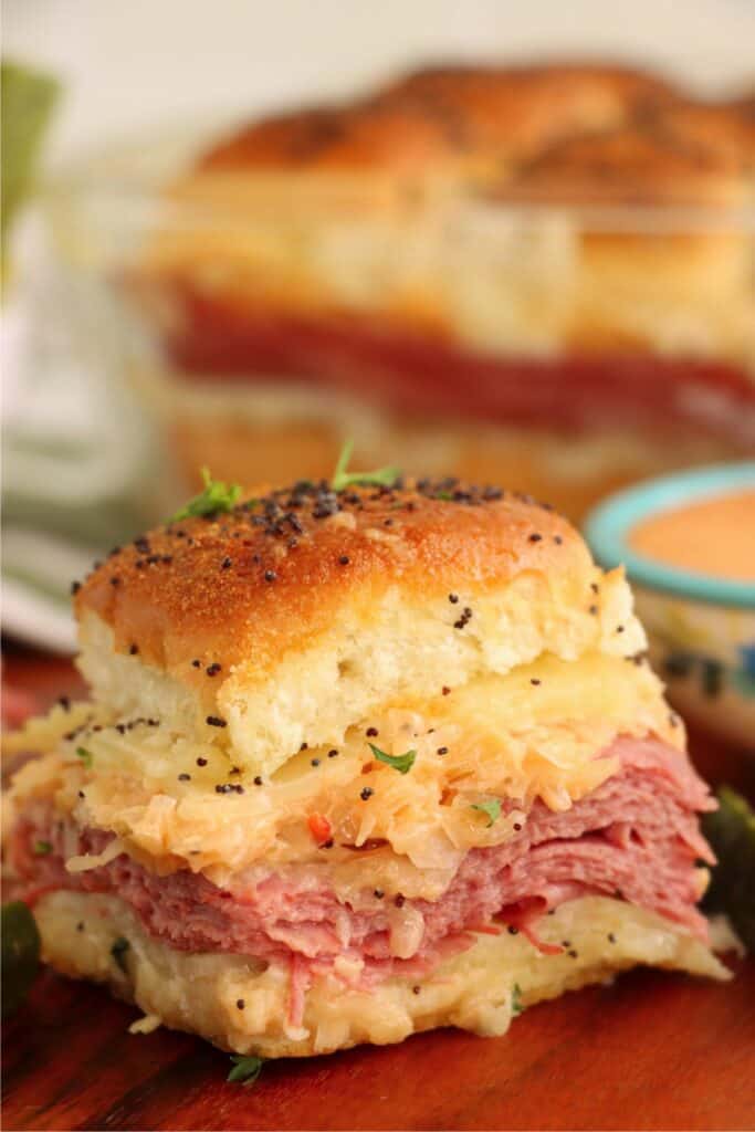 Closeup shot of corned beef slider on cutting board. 