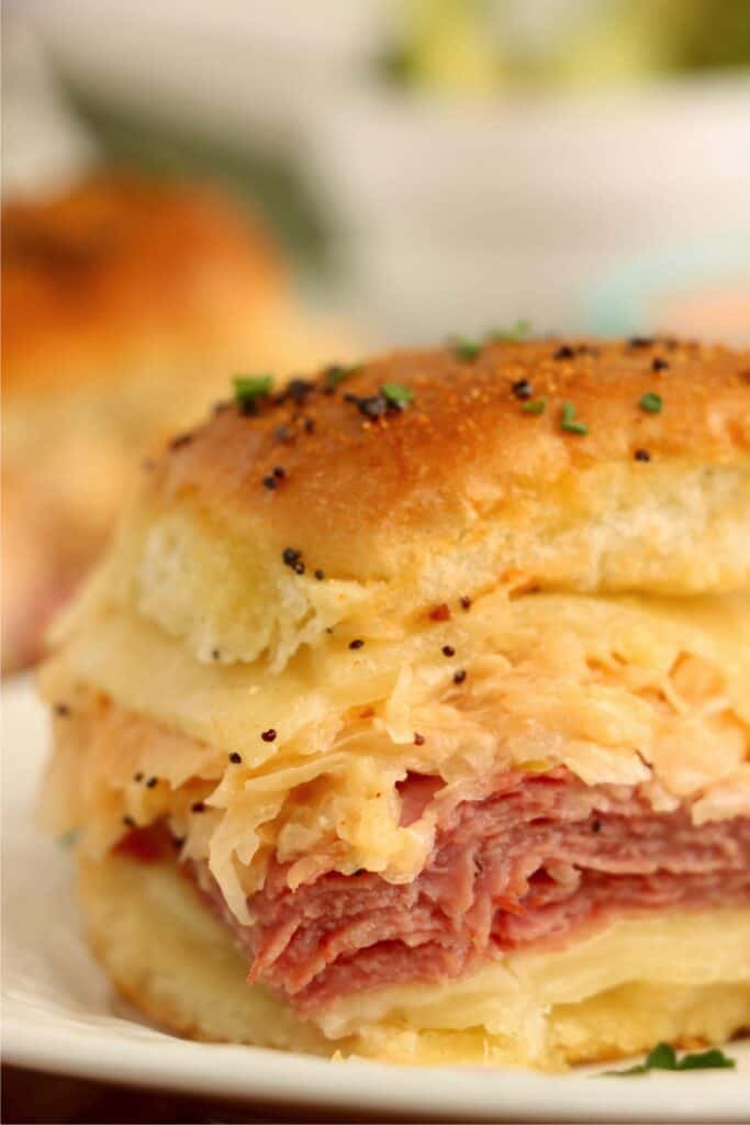 Closeup shot of corned beef slider on plate. 