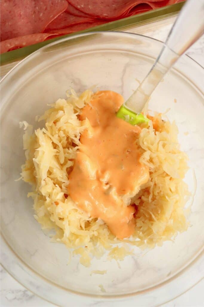 Overhead shot of sauerkraut and Thousand Island dressing in bowl. 