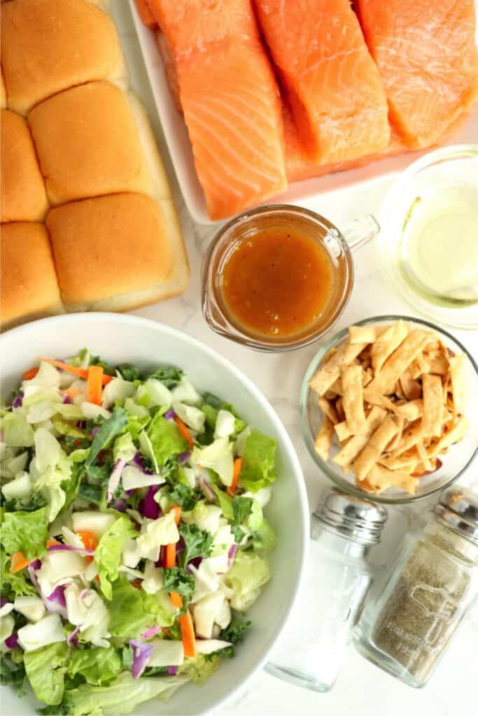 Overhead shot of individual salmon slider ingredients on table