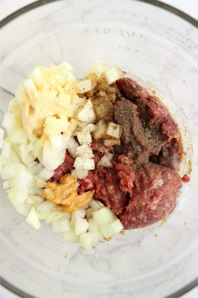 Overhead shot of all classic American burger recipe ingredients in bowl