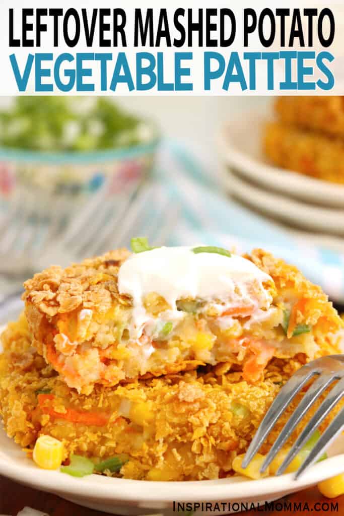 Closeup shot of two mashed potato and vegetable patties stacked atop one another on plate. 