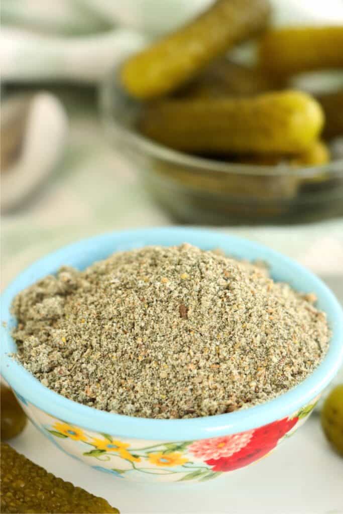 Closeup shot of bowlful of dill pickle seasoning. 