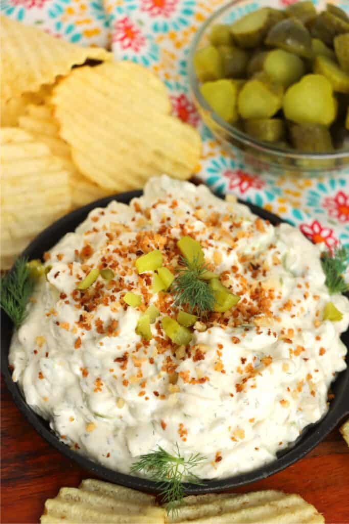 Closeup shot of fried pickle and ranch dip. 