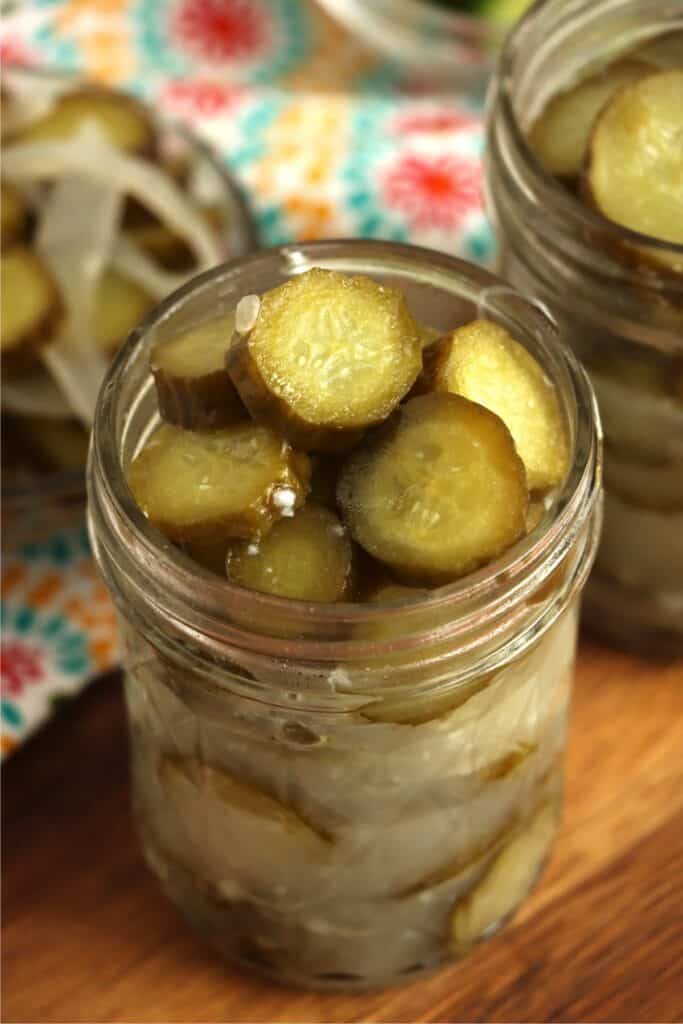 Closeup shot of jarful of homemade horseradish pickles. 