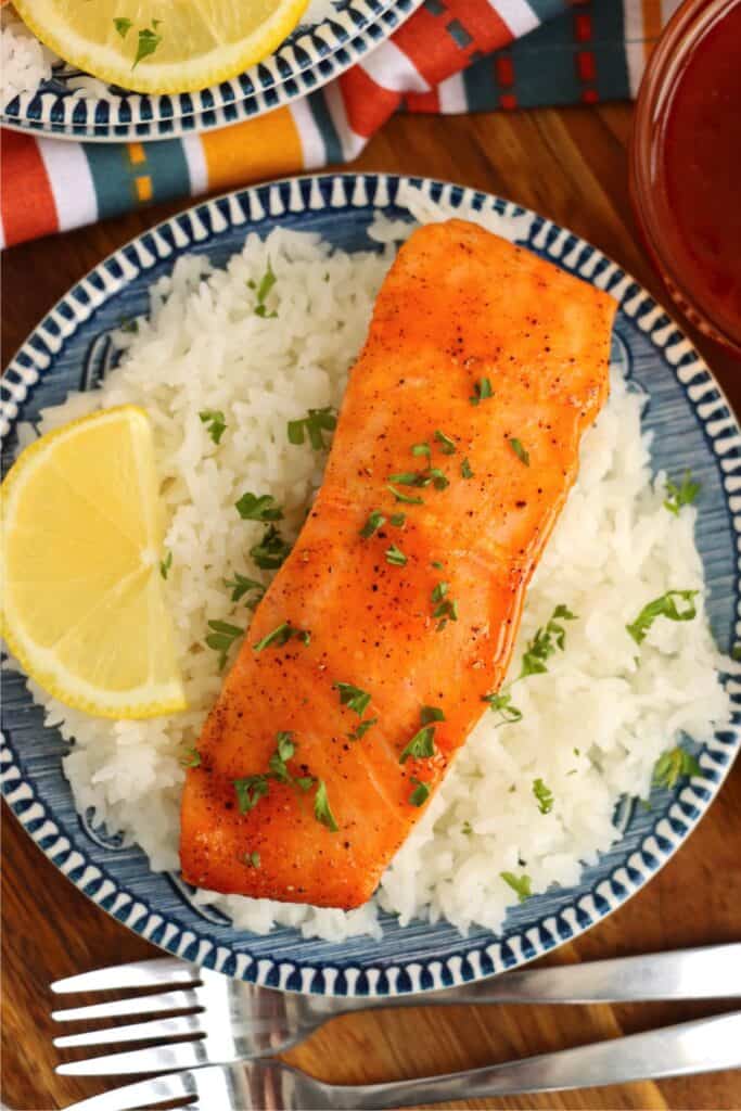 Overhead shot of hot honey salmon fillet over rice