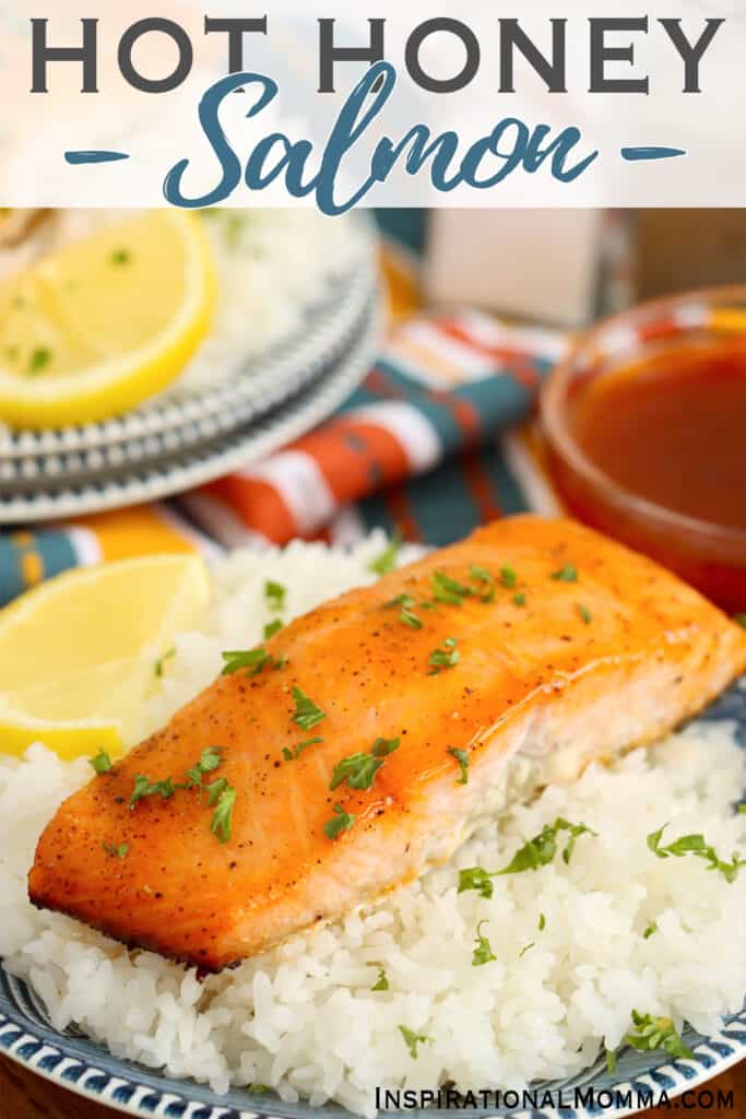 Closeup shot of hot honey salmon fillet on bed of rice.