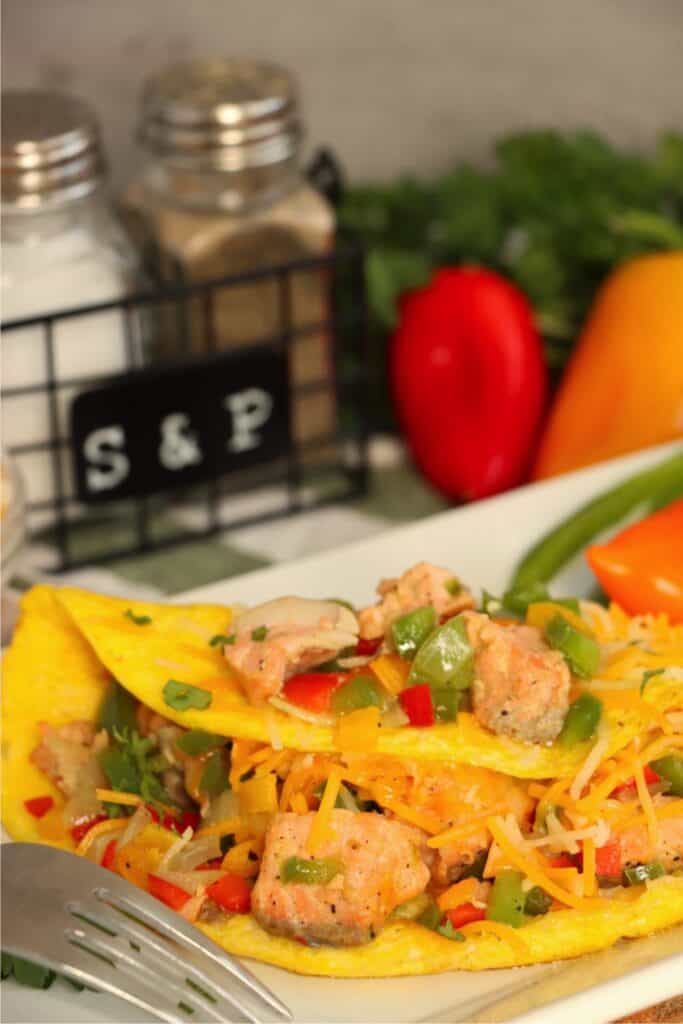 Closeup shot of plate with salmon omelet. 