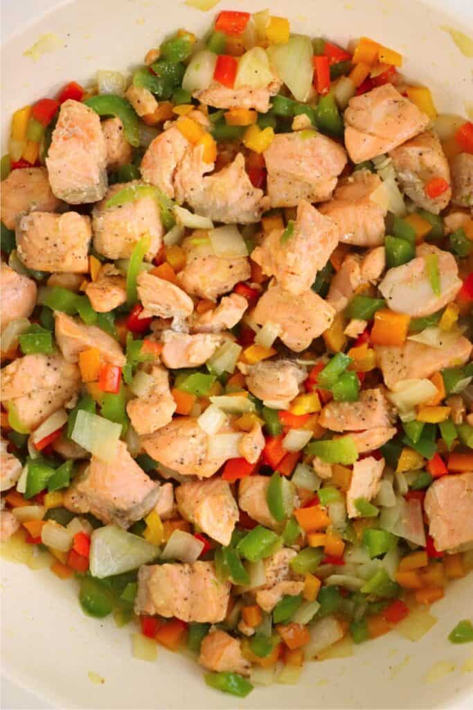 Closeup overhead shot of cooked salmon and vegetables. 