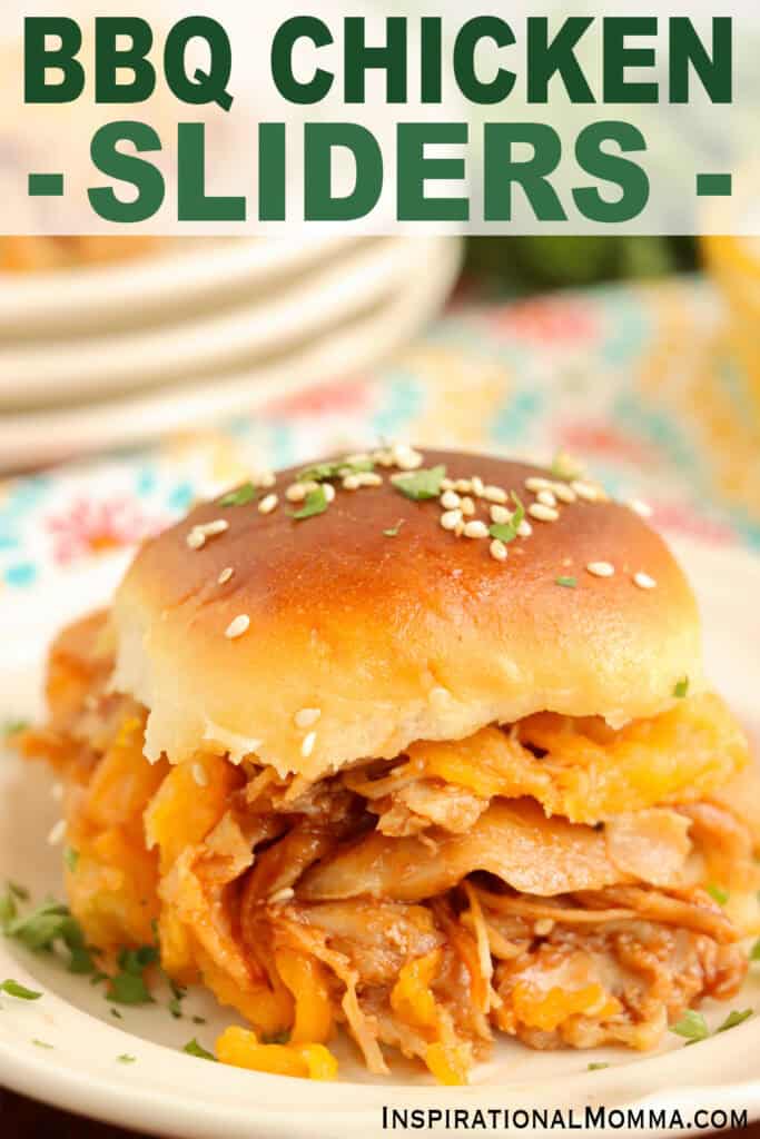 Closeup shot of BBQ chicken slider on plate.