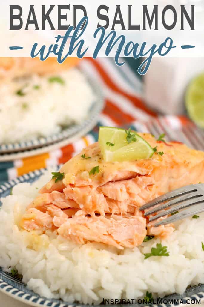 Closeup shot of bake salmon with mayonnaise over rice. 