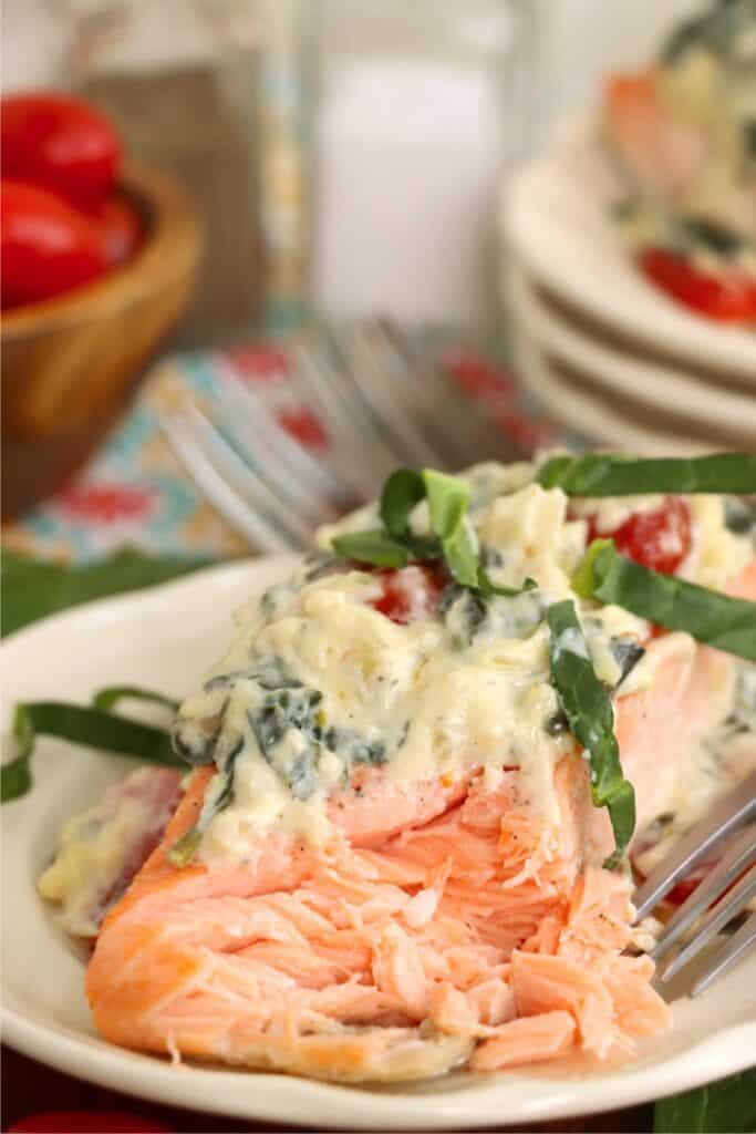 Closeup shot of salmon florentine on plate. 