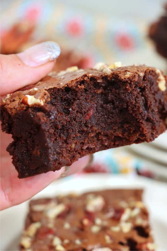 Closeup shot of brown butter brownie with bite taken out.