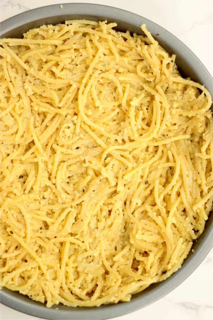 Closeup overhead shot of baked spaghetti crust.