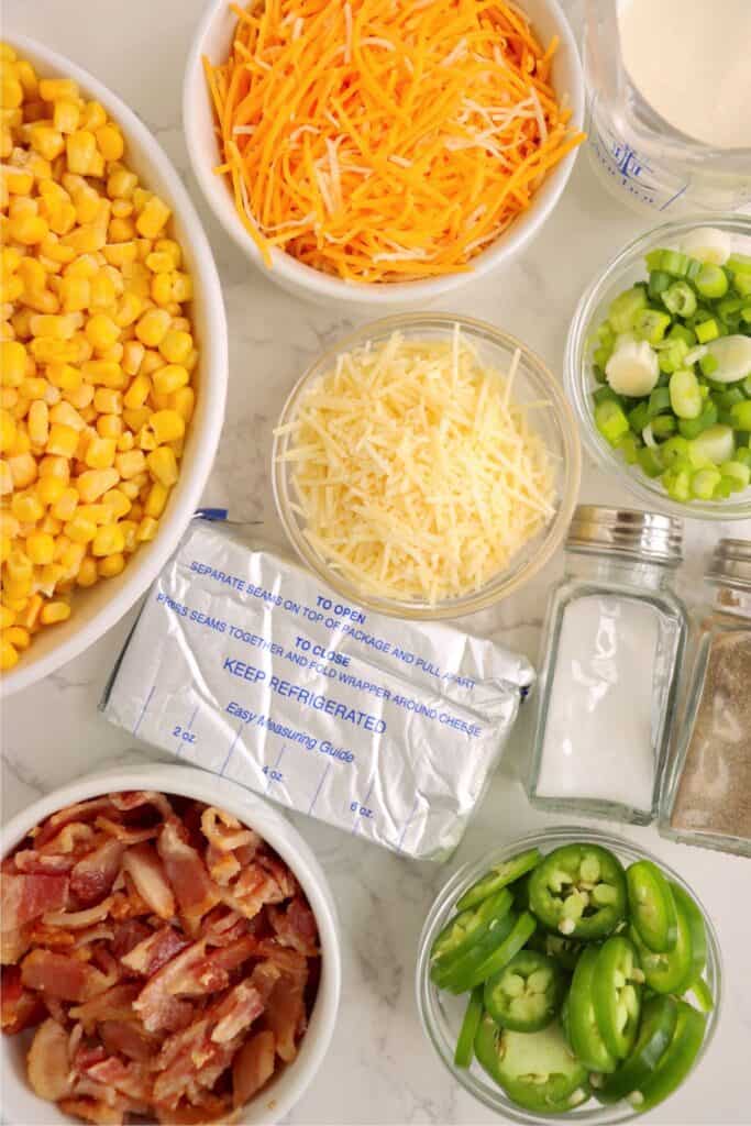 Overhead shot of individual crock pot jalapeno cream corn ingredients on table.