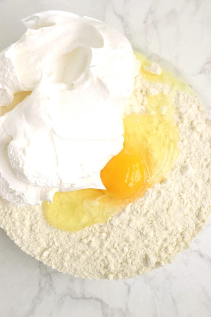 Overhead shot of lemon Cool Whip cookie ingredients in mixing bowl. 