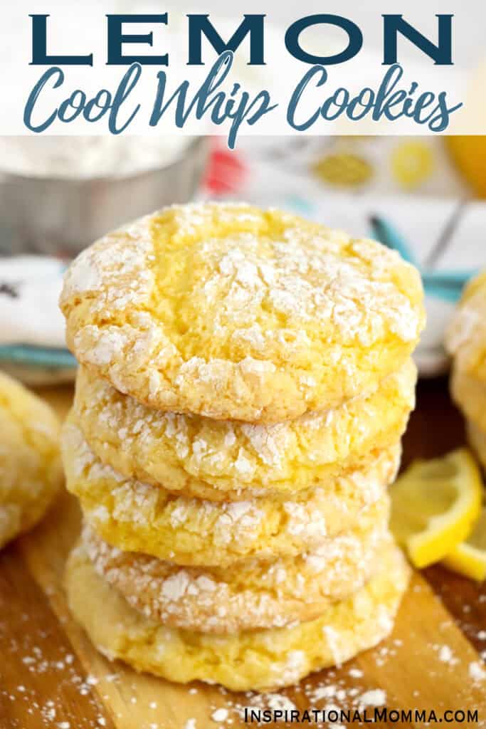 Closeup shot of lemon Cool Whip cookies stacked atop one another.