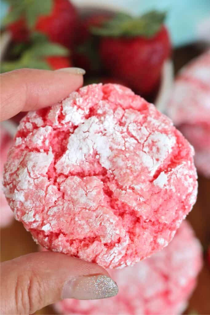 Closeup shot of hand holding a cake mix Cool Whip cookie.