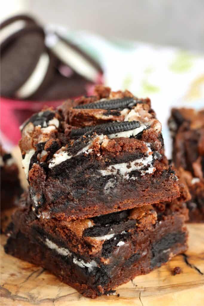 Closeup shot of two Oreo brownies stacked atop one another. 