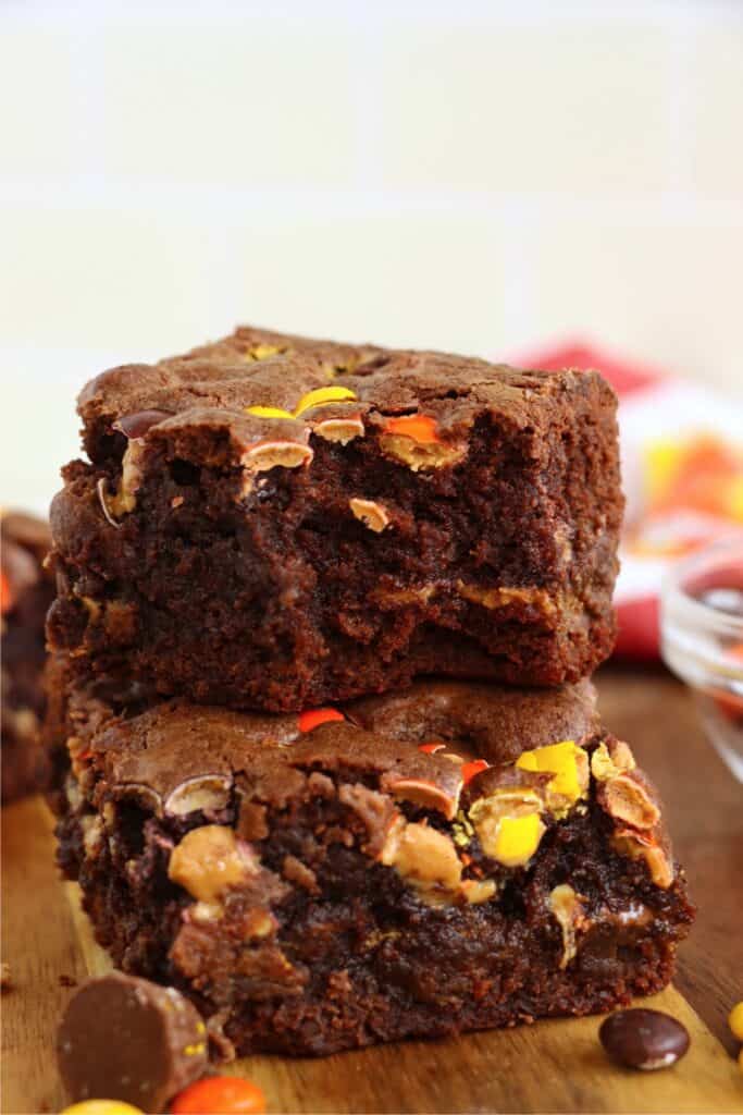 Closeup shot of two Reese's brownies stacked atop one another. 