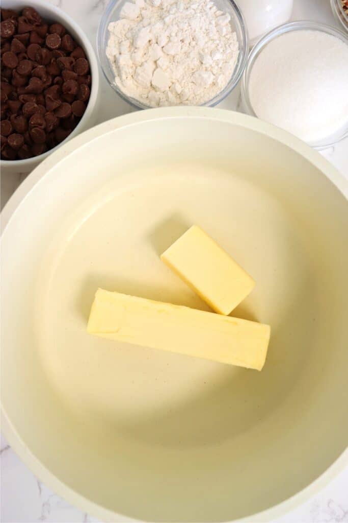 Overhead shot of butter in skillet. 
