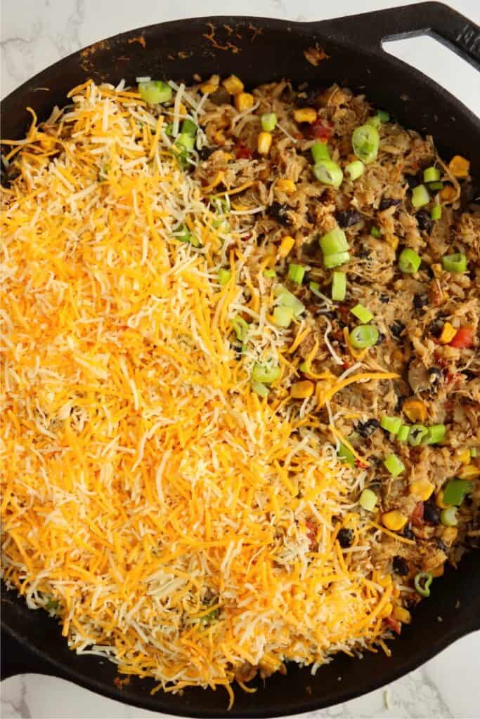 Overhead shot of skillet full of Mexican chicken and rice casserole.